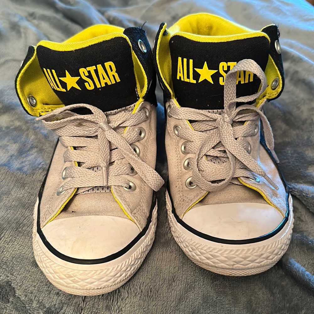 Black and yellow with gray converse